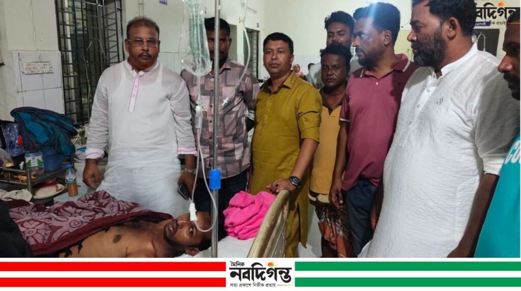 ধামইরহাট হাসপাতালে অসুস্থ সুজনকে দেখতে গেলেন রুহুল আমিন